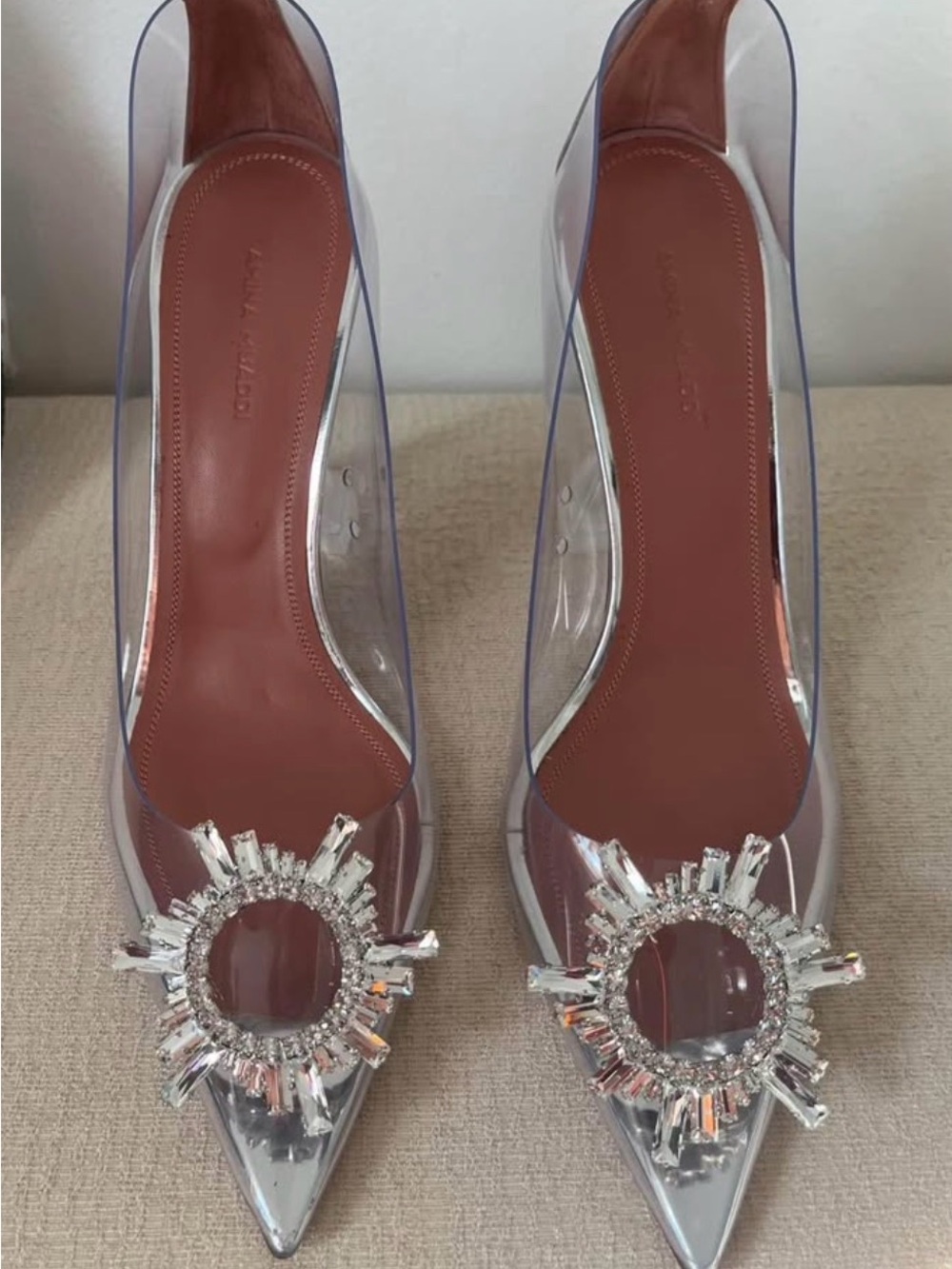 Amina Muaddi Clear Pointed-Toe Heels with Crystal Sunburst